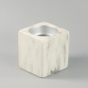 Portavelas de porcelana y mármol
